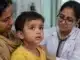 Measles symptoms and rash in a child during medical examination