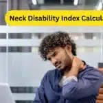 Neck Disability Index Calculator: Office worker experiencing neck discomfort while reading at a desk.