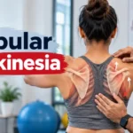 Physiotherapist assessing scapular dyskinesia during a shoulder examination.